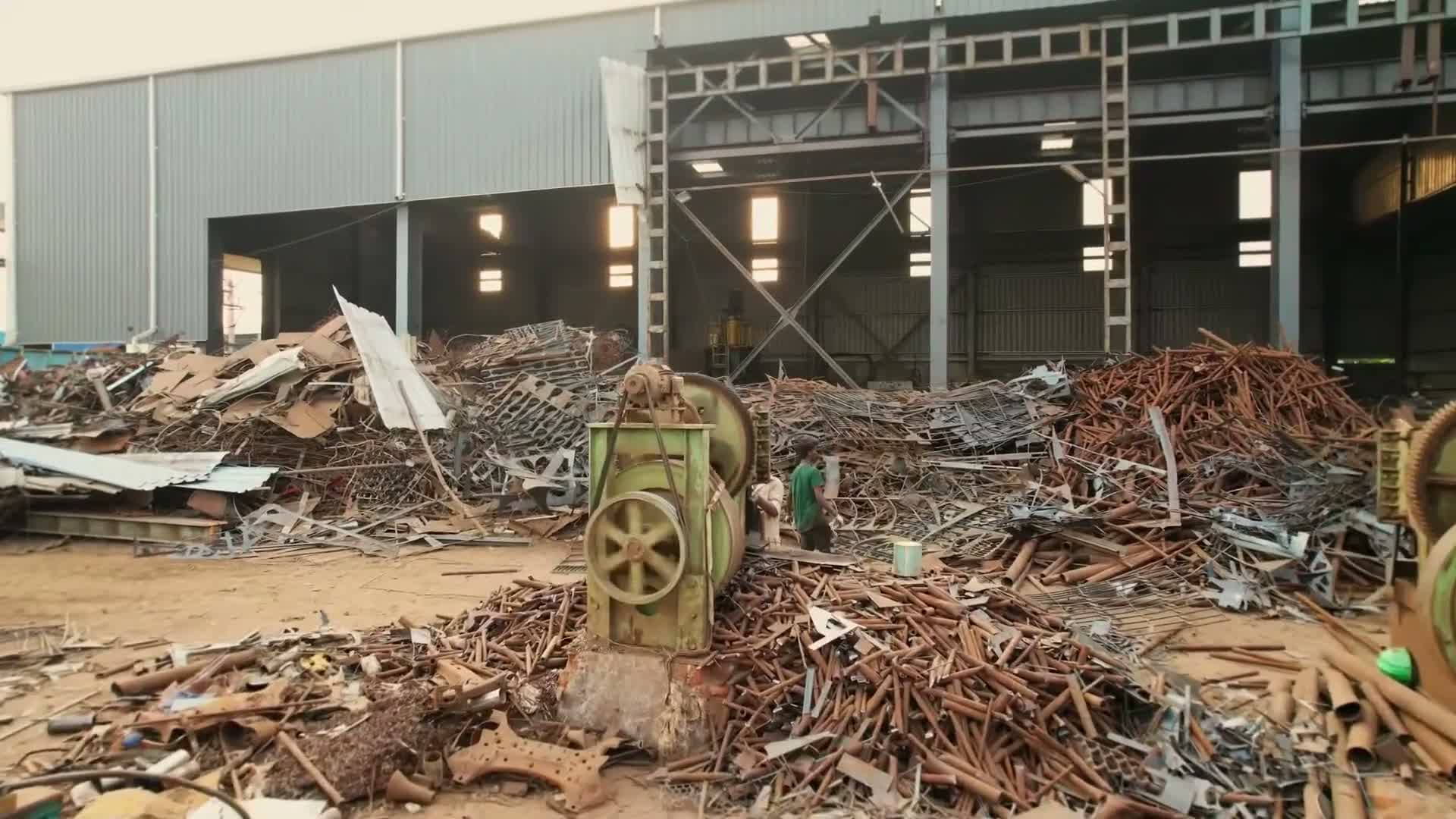 Scrap being fed into a cutting machine