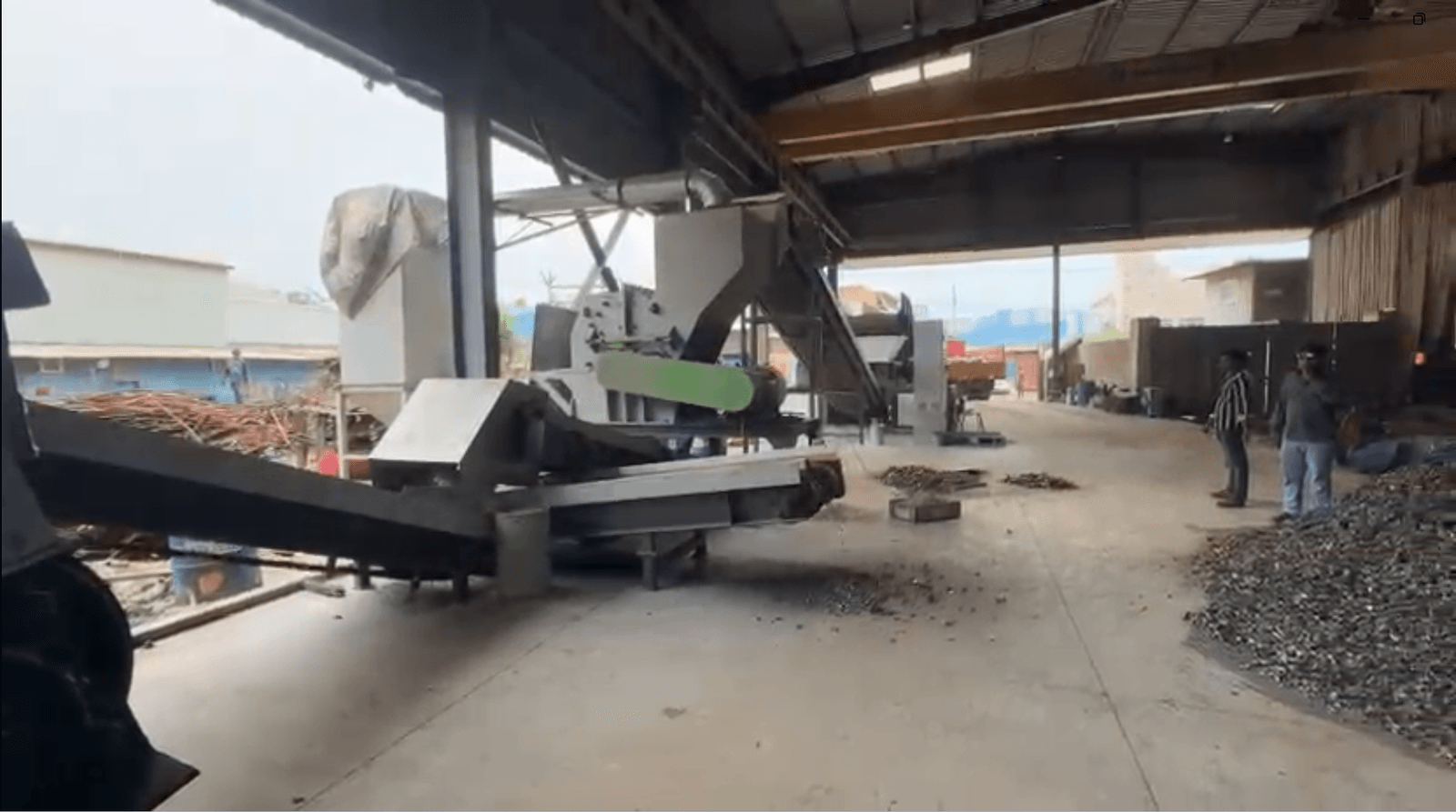 Shredder machine at the processing facility